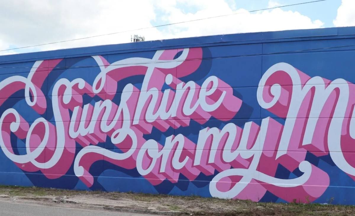 A mural of the words " sunshine on my life ".