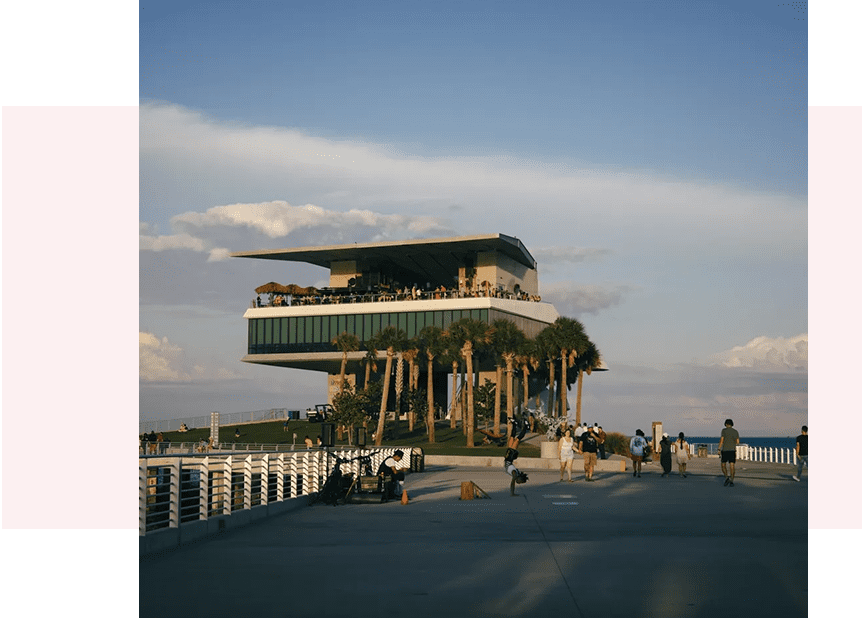 A building with palm trees on top of it